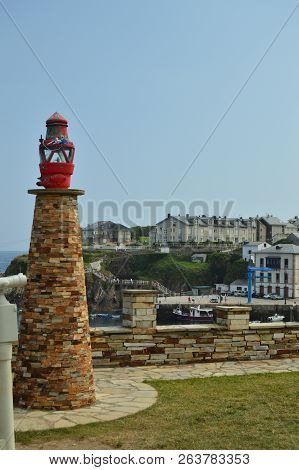 Monument With A Lantern With The Fishing Port To The Bottom In Tapia De Casariego. Nature, Travel, R