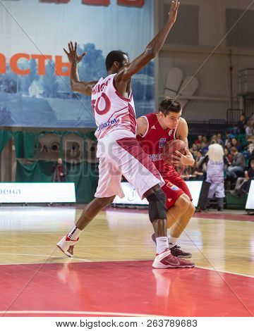 Samara, Russia - December 17: Bc Atomeromu Guard Akos Kovacs #6 With Ball Tries To Go Past A Bc Kras
