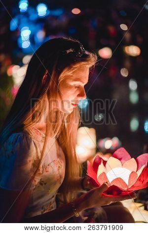 Young Womant With Chinese Lanterns Floating In Lake
