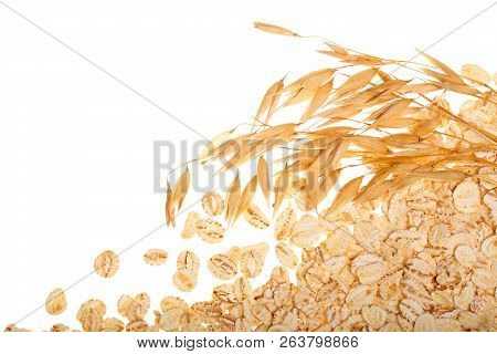 Oat Flakes With Oat Spike Isolated On White Background With Copy Space For Your Text. Top View
