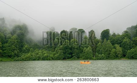 Artvin, Turkey - July 2018: People In A Rowing Boat In Borcka Karagol Nature Park