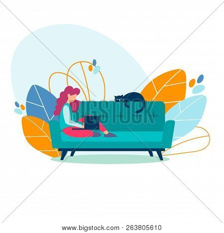 Student Girl, Freelancer Studying, Working On A Laptop At Home Sitting On The Couch With Her Cat. Fr