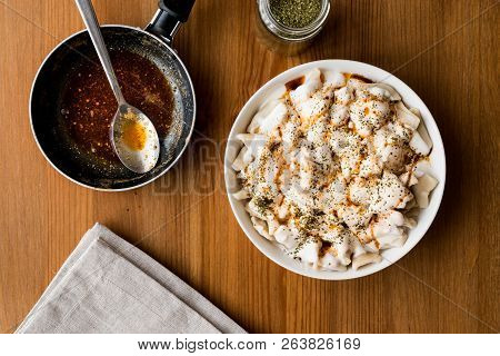 Turkish Manti Manlama / Ravioli With Yogurt And Fried Butter Sauce.