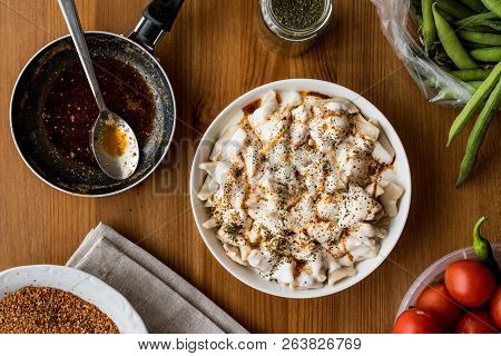 Turkish Manti Manlama / Ravioli With Yogurt And Fried Butter Sauce. Traditional Turkish Food.