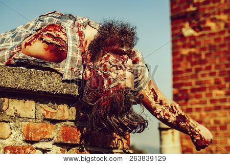 Bearded Zombie Man With Beard Vampire Or Bloody War Soldier With Wounds And Red Blood With Halloween