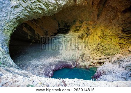 Mystic Deep Water Hole In Rocks  In Fontaine-de-vaucluse, Source Of River Sourge In Low Stand During