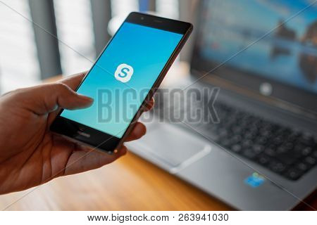 Chiang Mai, Thailand - July 14,2018: Man Holding Huawei With Skype Apps. Skype Is Part Of Microsoft,
