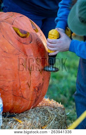 Chadds Ford, Pa - October 18: Person Carving Pumpkin At The Great Pumpkin Carve Carving Contest On O