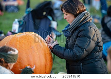 Chadds Ford, Pa - October 18: Person Carving Pumpkin At The Great Pumpkin Carve Carving Contest On O