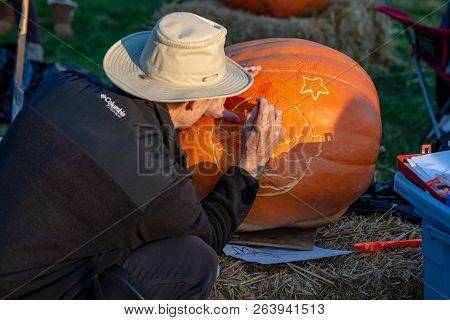 Chadds Ford, Pa - October 18: Person Carving Pumpkin At The Great Pumpkin Carve Carving Contest On O