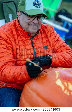 Chadds Ford, Pa - October 18: Person Carving Pumpkin At The Great Pumpkin Carve Carving Contest On O