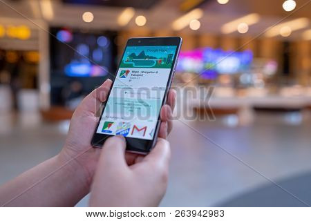 Chiang Mai, Thailand - August 03,2018: Woman Holding Huawei With Google Maps On The Screen.google Ma