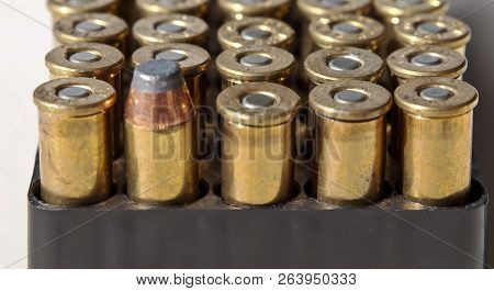 A Box Of 44 Magnum Bullets In Their Case With One Of The Bullets Showing The Bullet Itself With The 