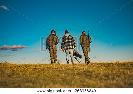 Hunters With Shotgun Gun On Hunt. Closed And Open Hunting Season. Track Down