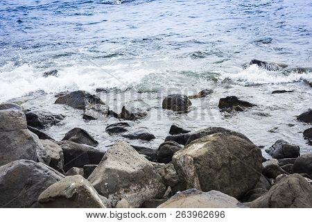 Rocky Sea Shore Of Acitrezza Next To Cyclops Islands, Catania, Sicily, Italy