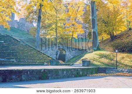 Old Casttle Park At Autumn. Yellow Leafs, Ruins And Architecture. Historic Buildings. Travel Photo 2