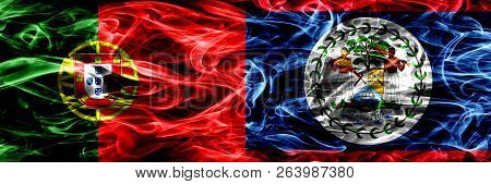 Portugal Vs Belize, Belizean Smoke Flags Placed Side By Side. Thick Colored Silky Smoke Flags Of Por