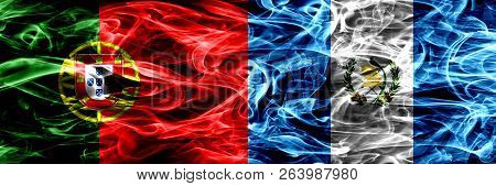 Portugal Vs Guatemala, Guatemalan Smoke Flags Placed Side By Side. Thick Colored Silky Smoke Flags O