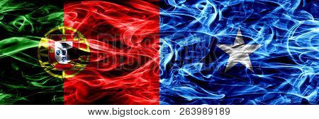 Portugal Vs Somalia, Somalian Smoke Flags Placed Side By Side. Thick Colored Silky Smoke Flags Of Po