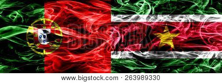 Portugal Vs Suriname, Surinamese Smoke Flags Placed Side By Side. Thick Colored Silky Smoke Flags Of