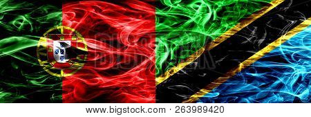 Portugal Vs Tanzania, Tanzanian Smoke Flags Placed Side By Side. Thick Colored Silky Smoke Flags Of 