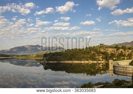 Swamp Of Beniarres One Day With White Clouds Reflected In The Water.