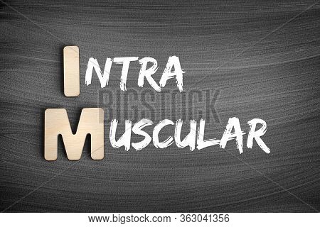 Im - Intramuscular Acronym, Medical Concept On Blackboard