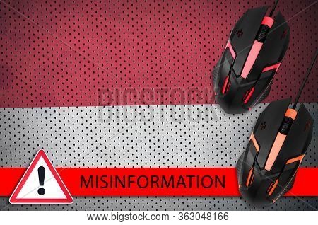 Indonesia Flag And Two Computer Mouses. Misinformation During Coronavirus Or 2019-ncov Virus Concept