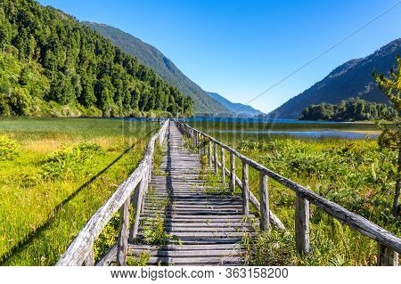 Wooden Bridge Across River Murta, Landscape With Beautiful Mountains View, Patagonia, Chile, South A