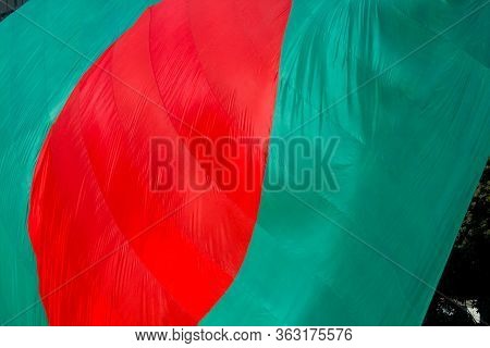 Bangladeshi Flag Waving In Sky At Dhaka, Bangladesh.