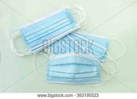Blue Medical Doctor Face Masks Photo. Surgical Earloop Mask For Disease Prevention.