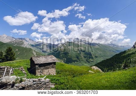 Very Old Abandoned Traditional Alpine House, Used In The Past By Shepherd Of The Italian Alps Of Pie