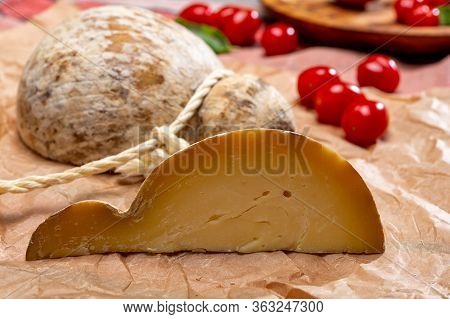 Italian Semi Hard Matured Caciocavallo Cheese, Handmade And Aged In Natural Underground Caves In Apu