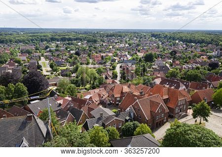 Bad Bentheim, Germany June 2019. Panorama Of The Old Town With Many Buildings With A Red Roof On A B
