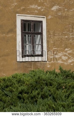 Old Window In The Wall On A Cottage