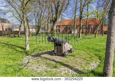 Cannon In The Historic Center Of Oudeschans, Holland