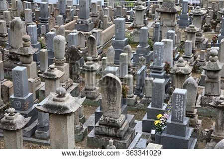 Onomichi, Japan - April 22, 2012: Cemetery In Onomichi, Japan. As Of 2007 99.8 Percent Of Japanese W