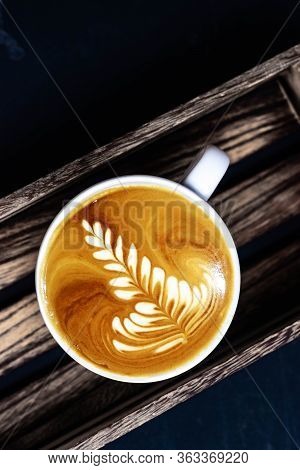 White Cup Latte Art Barista Cappussino On A Wooden Table