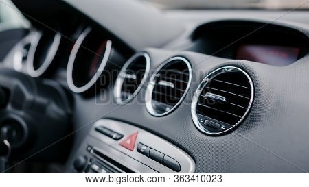Close-up Of Air Vent In Car. Red Emergency Button On A Dashboard Of Car.