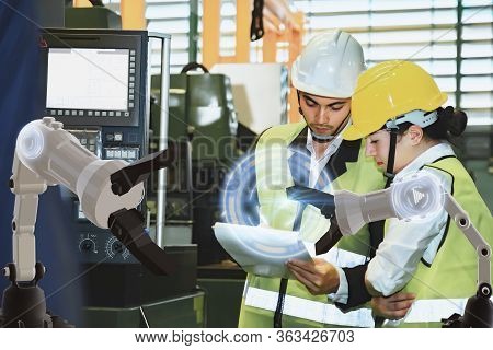 Asian Male Engineer Factory Inspection Computer Control With Hand Robot Ai Machine Assist Production