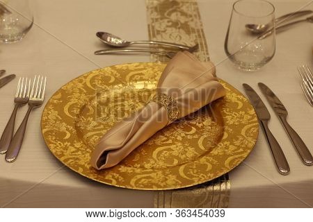 Arabic Theme Table With Golden Plate And Cutlery
