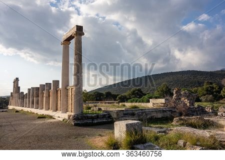 Ruins Of Ancient Abaton Of Epidaurus, Greece At Beautiful Sunset With Wamr Colours