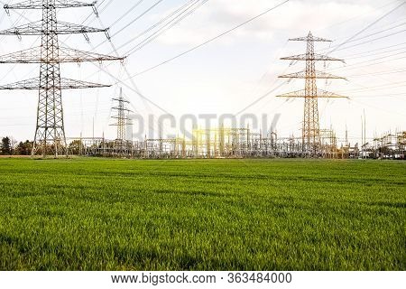 The Power Transmission Towers Of Sunset Sky Background . Electric Tower