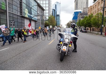 Downtown Vancouver, Bc, Canada - Apr 26, 2020: Anti Lockdown Protesters March In Defiance Of The Gov