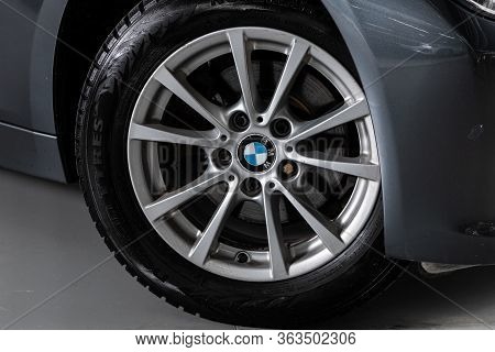Novosibirsk/ Russia - April 02 2020: Bmw 3-series, Car Wheel With Alloy Wheel And New Rubber On A Ca