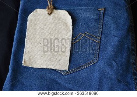 Plain Clothing Tag Mockup On Jeans Background