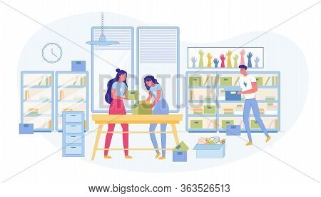 Man Women Volunteers Team Collecting Goods Into Boxes. Food, Clothes, Toys For Donation Funds. Socia