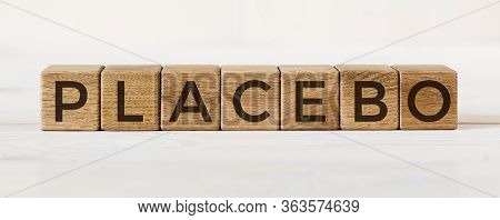 Placebo Word Written On Blocks. Placebo Effect, Fake Medical Treatment