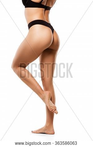 Beautiful Female Back And Buttlocks Isolated On White Background. Beauty, Cosmetics, Spa, Depilation
