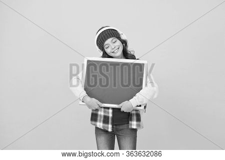 Girl Cute Little Child Wear Headphones Listen Music Hold Chalkboard Copy Space. Small Kid Listen Mus